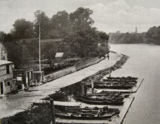 Boats lined up by Kew Bridge